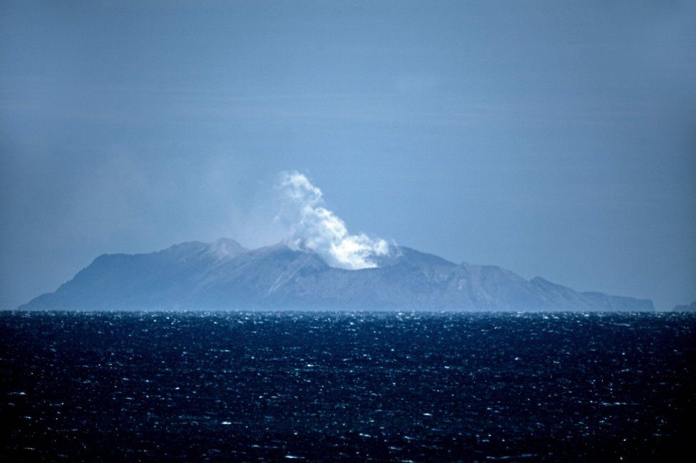 Steam rises from the White Island volcano