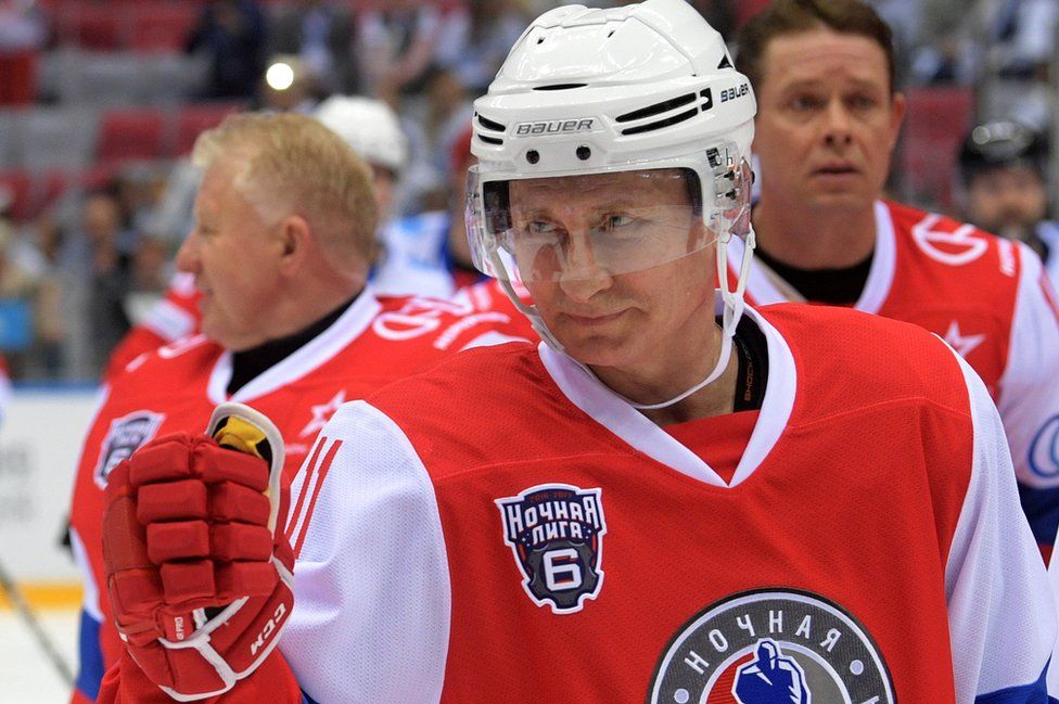 Russian President Vladimir Putin plays hockey in Sochi, Russia