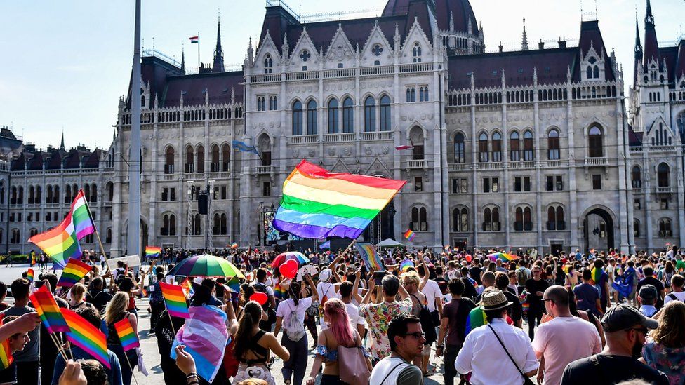 People march to the parliament building during the Pride Parade in Budapest, Hungary