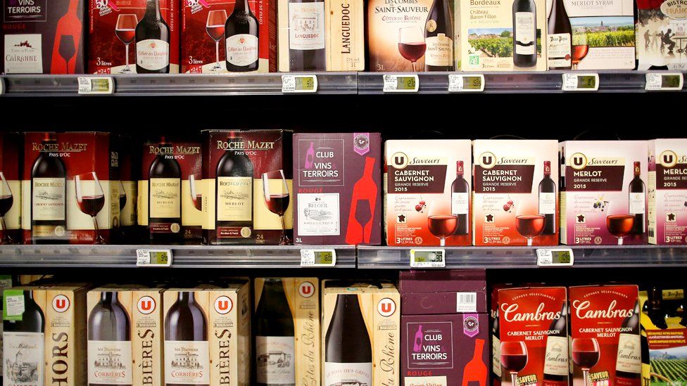 Rows of box wines with bag-in-box packaging in a supermarket