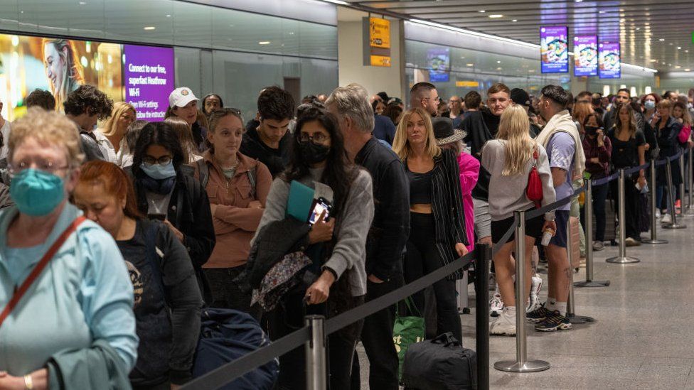 Queue for security at Heathrow Airport in June