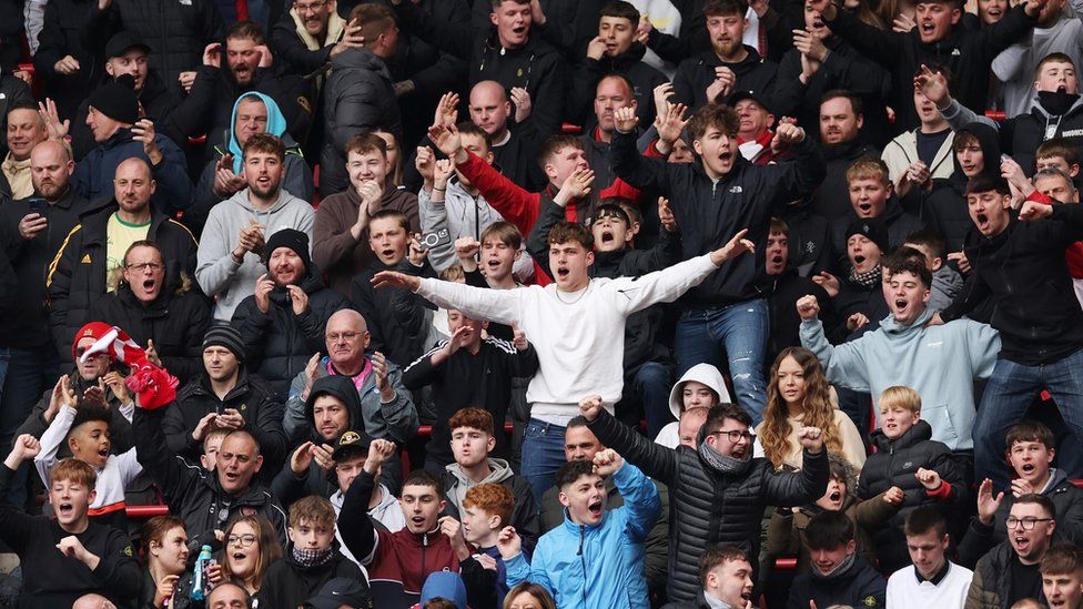 Bristol City fans in the stands cheer their second goal against Rotherham at Ashton Gate