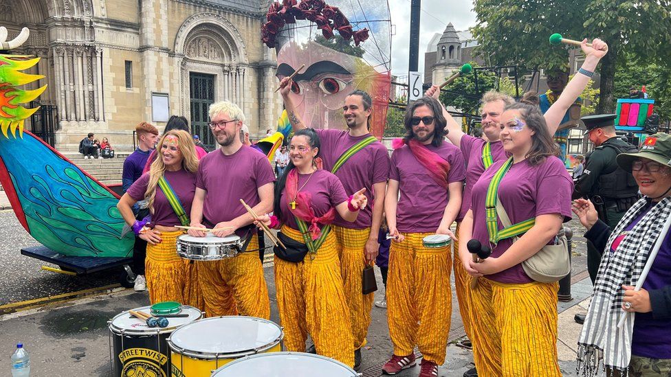 A group of drummers gather outside St Anne's Cathedral in Belfast