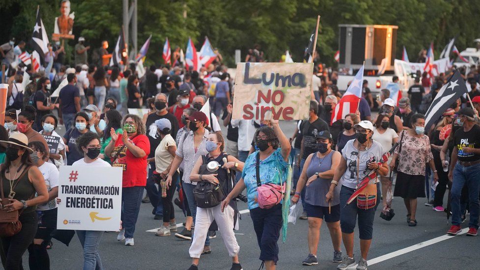 Protesters march during a demonstration against LUMA Energy in what organizers called All of Puerto Rico Against LUMA on October 15, 2021 in San Juan, Puerto Rico.