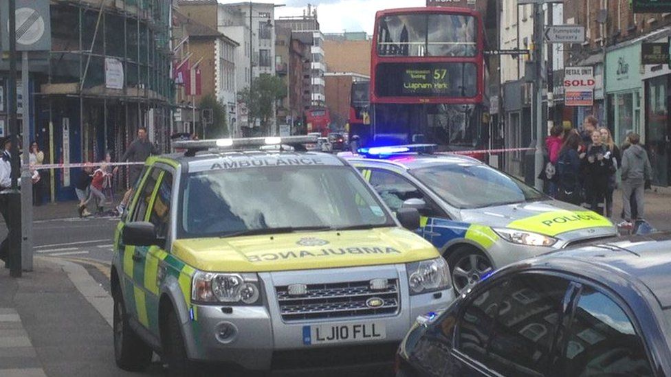 Police and ambulance cars in Wimbledon