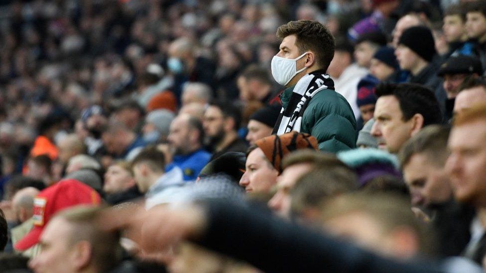 Football fan wearing face covering at Newcastle United v Manchester City on 19 December 2021