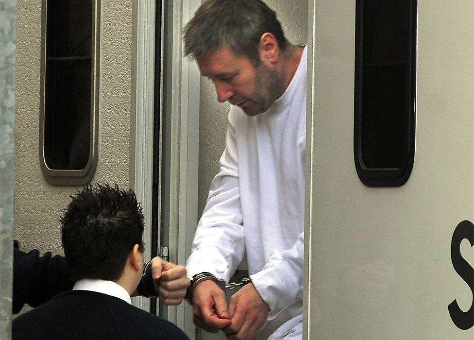 File image of John Worboys being led in handcuffs from a prison van