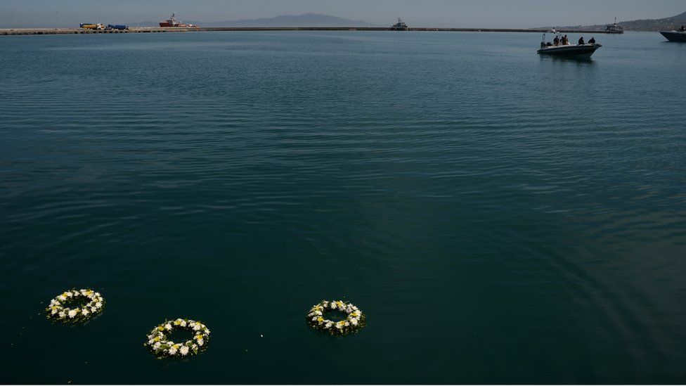 Wreathes thrown by Pope Francis into the sea