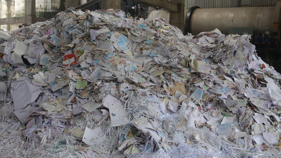 Imported waste paper at a recycling plant in Gujarat