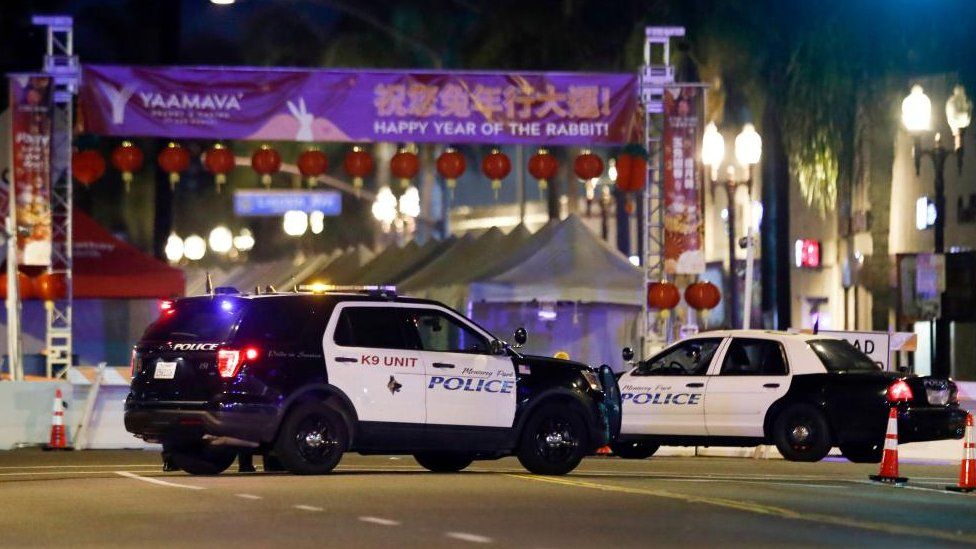 Police gather after the Monterey Park shooting