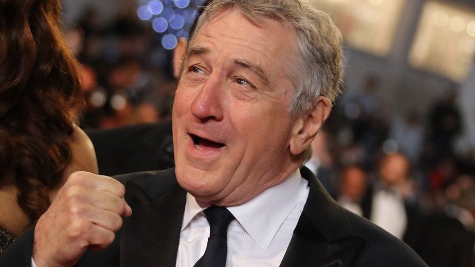 US actor Robert de Niro poses as he arrives on May 16, 2016 for the screening of the film 'Hands of Stone' at the 69th Cannes Film Festival in Cannes, southern France.