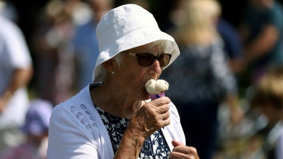 Woman eats ice cream