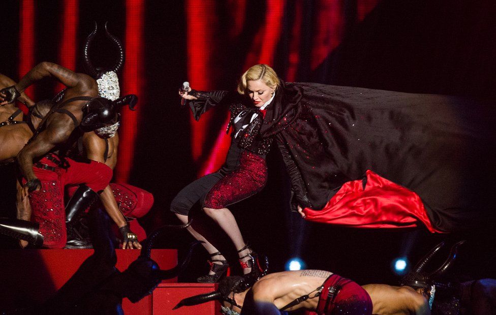 Madonna falls as she performs on stage for the BRIT Awards 2015 at The O2 Arena in 2015 in London