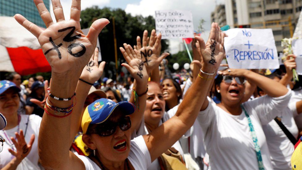 women march in Caracas