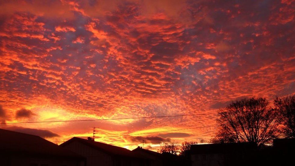 Spectacular sunsets light up UK skies BBC News