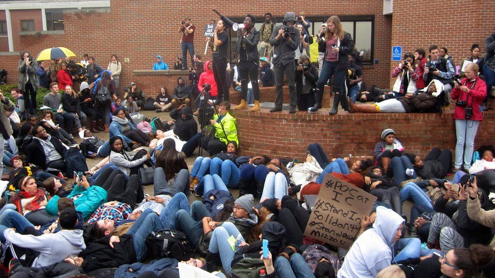 Protesters take part in a "die-in" at Ithaca College in Ithaca, New York (11 November 2015)