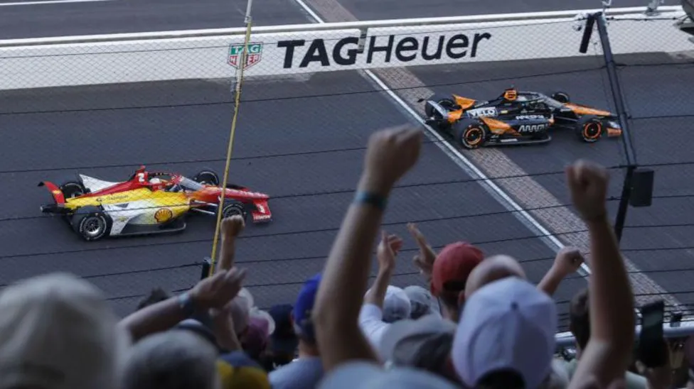 Newgarden Clinches Indy 500 Victory in Thrilling Final Lap of Storm-Delayed Race.