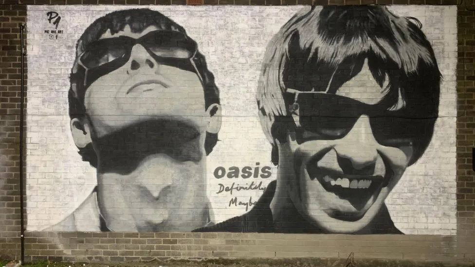 Mural of Noel and Liam Gallagher outside Sifters Records in Manchester