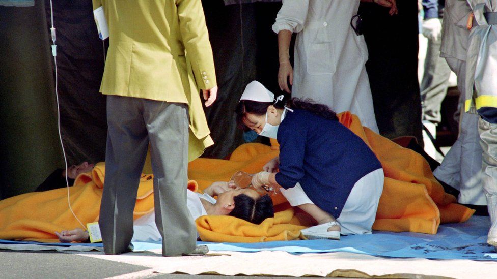 Victims of the 1995 attack being treated by a nurse