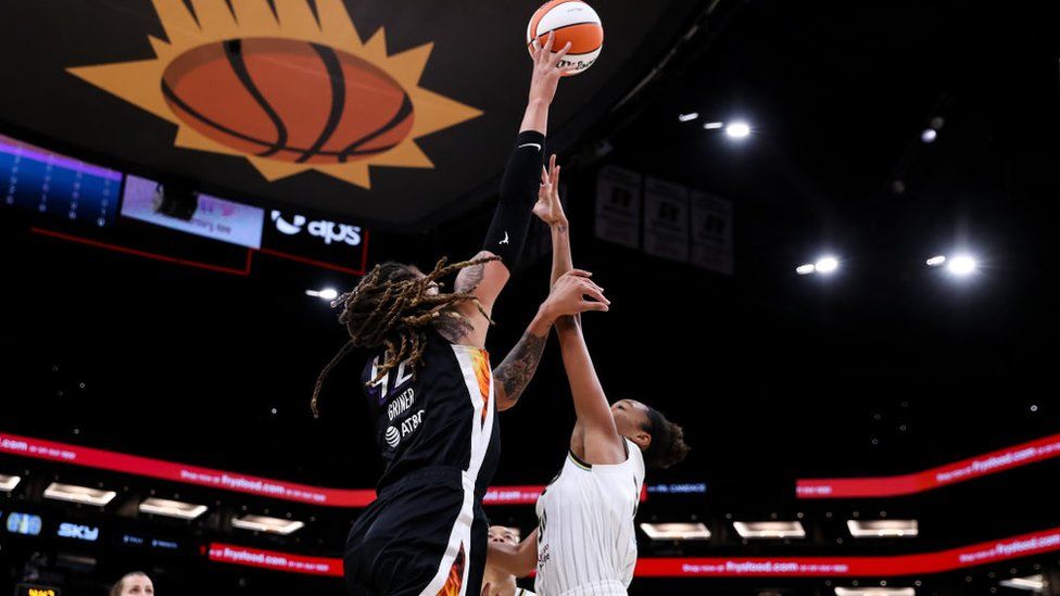 Brittney Griner #42 of the Phoenix Mercury shoots over Azurá Stevens #30 of the Chicago Sky in the first half at Footprint Center on October 10, 2021 in Phoenix, Arizona.