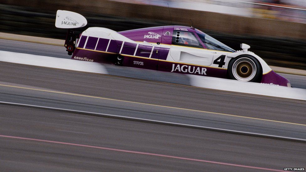 A Jaguar car on a racetrack
