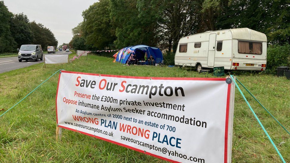 Scampton protest sign
