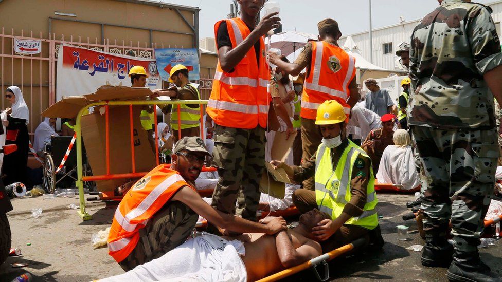 Saudi rescue workers attend to pilgrims injured in a stampede in Mina, Saudi Arabia, during the 2015 Hajj (24 September 2015)