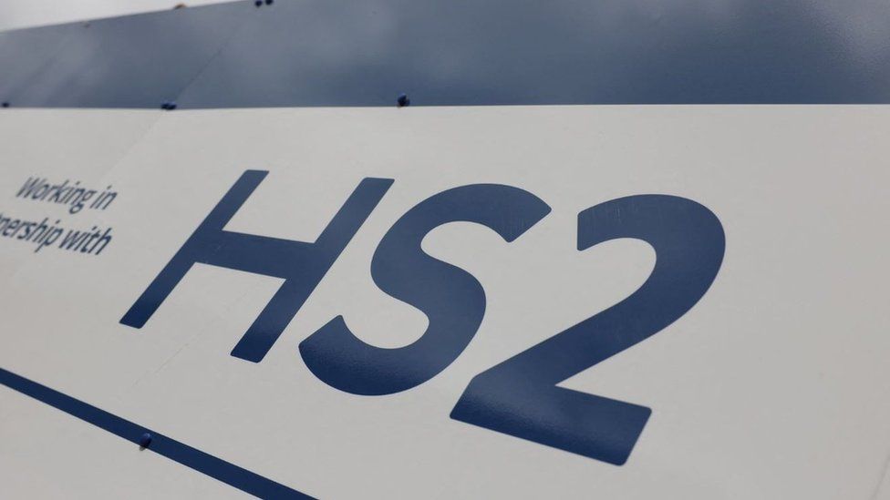 A HS2 high-speed rail logo is displayed on a fence surrounding a construction site at Euston in London, Britain.