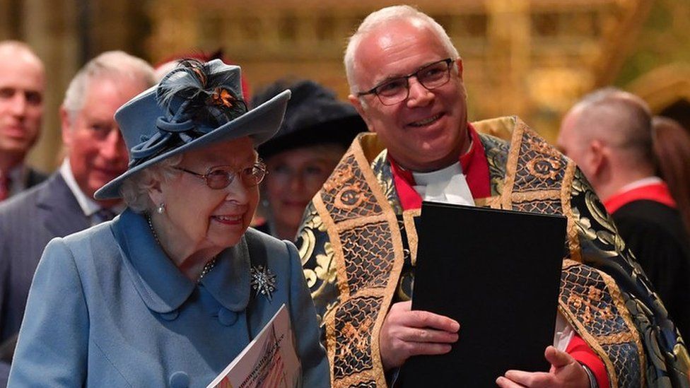 Queen Elizabeth II is introduced to performers by Dr David Hoyle as she leaves the Commonwealth Day Service 2020