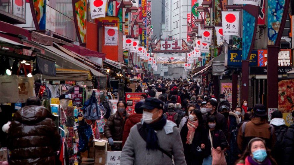 Japan&#39;s economy shrinks 4.8% in 2020 due to Covid - BBC News