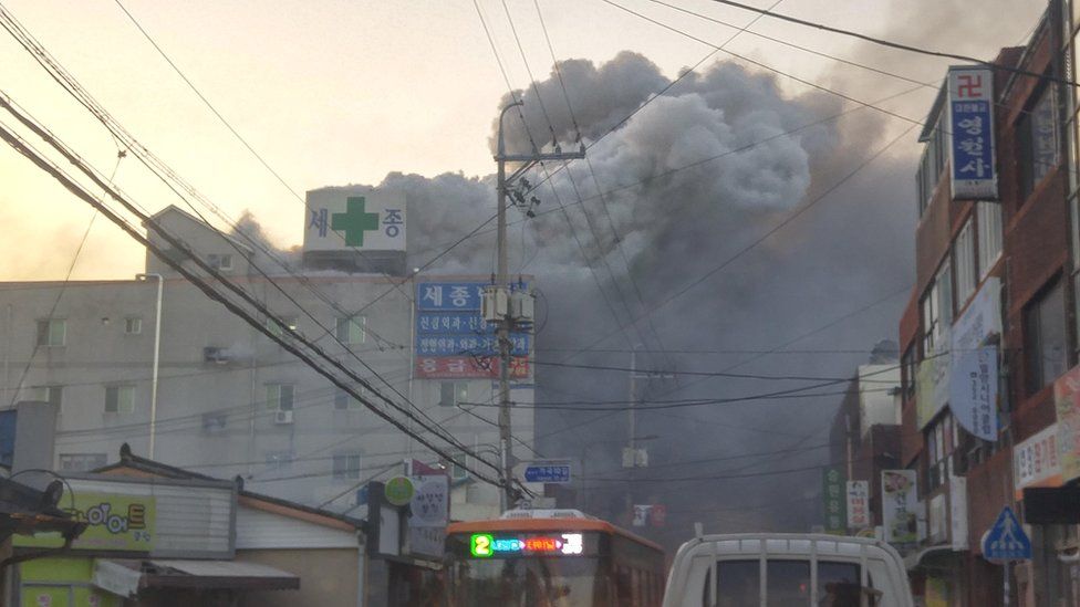 Smoke rises from a burning hospital in Miryang, South Korea