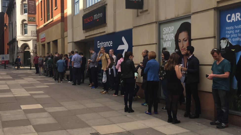 Queue of people in Manchester