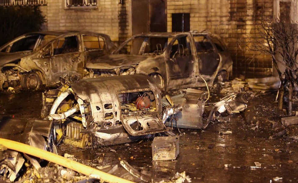 Debris and burnt-out cars in Yeysk, 17 Oct 22