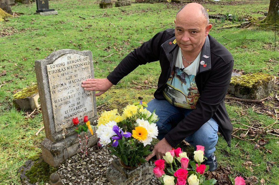 Allan Mottley at his mother's grave