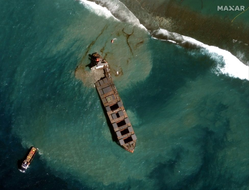 Satellite image shows tug boats and Japanese bulk carrier MV Wakashio