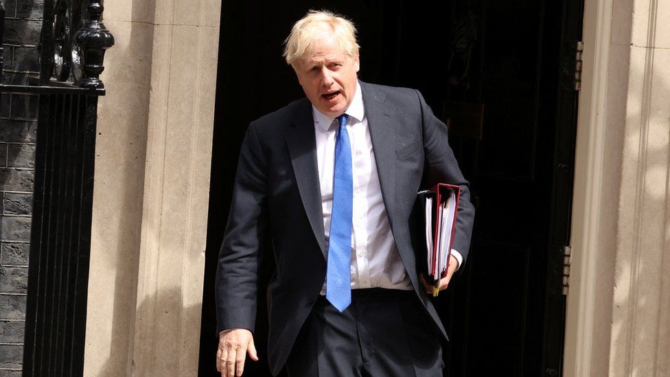 British Prime Minister Boris Johnson walks at Downing Street in London, Britain July 6, 2022