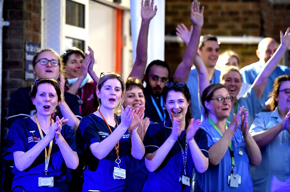 NHS staff applaud outside the Dorset County Hospital in Dorchester