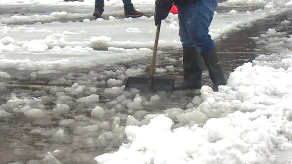 snow being cleared