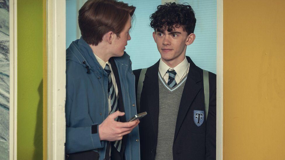 Kit Connor and Joe Locke in Heartstopper series, dressed in school uniforms