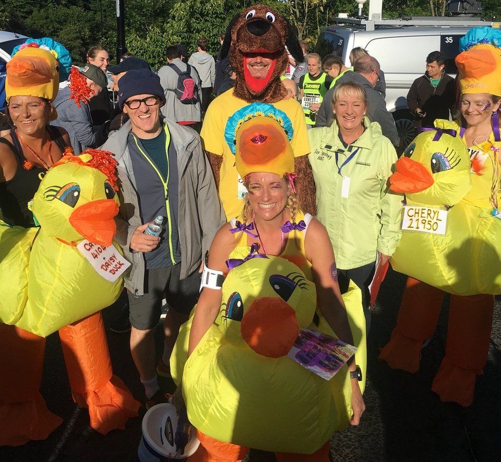 Great North Run participants dressed as dogs ducks