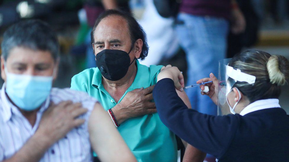 A man receives the Pfizer-BioNTech coronavirus disease (COVID-19) vaccine during a mass vaccination in Mexico City, Mexico March 10, 2021.