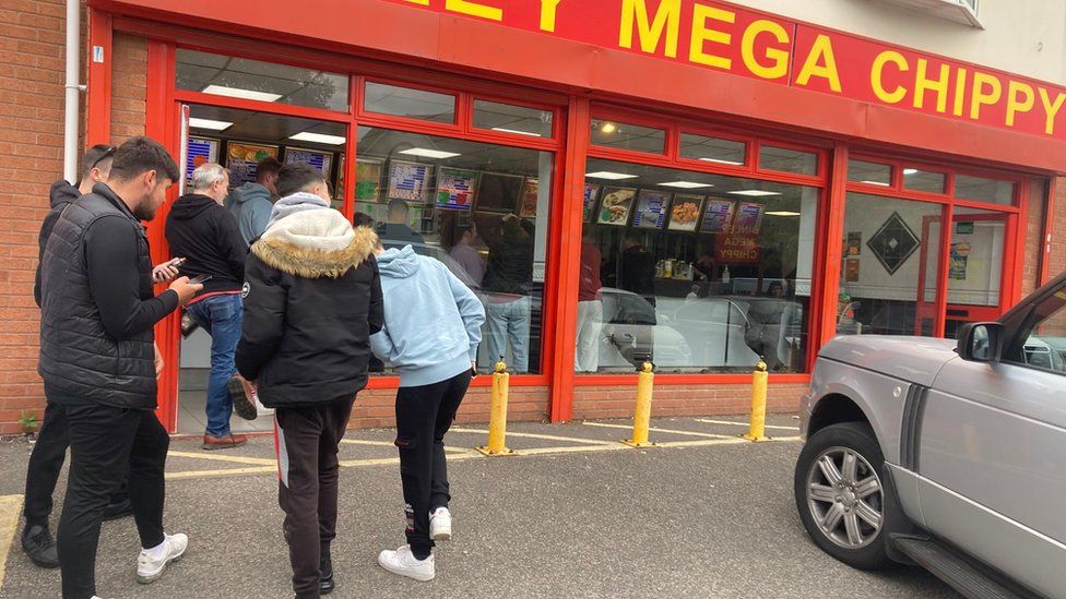 People quueing outside Binley Mega Chippy