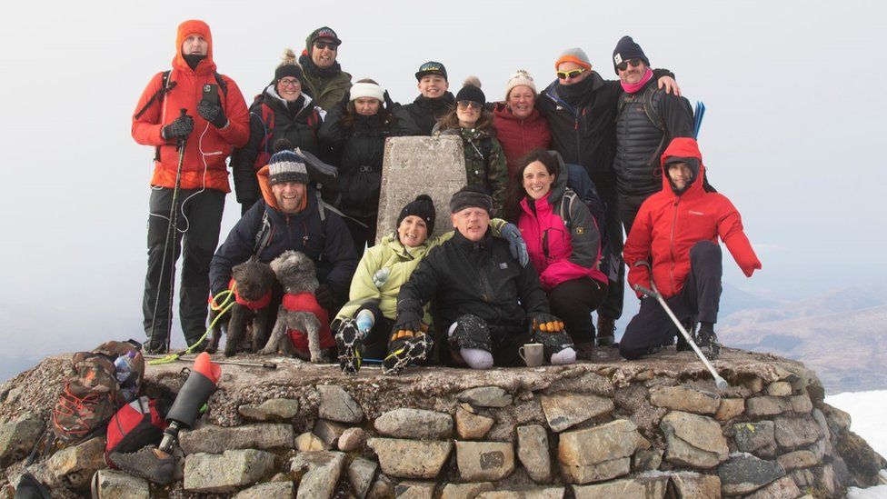 AmpCamp fundraisers at the top of Ben Nevis
