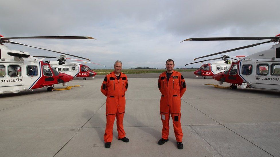 Inverness crew members with the new AW189s front and the S92s in the background