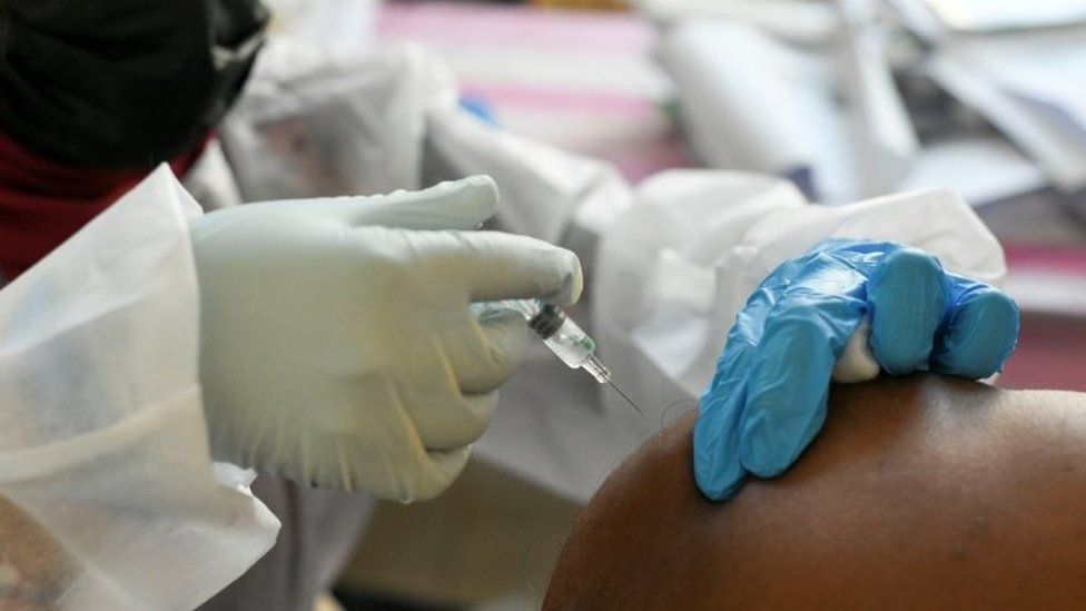 File photograph of man receiving coronavirus vaccine in Abu Dhabi