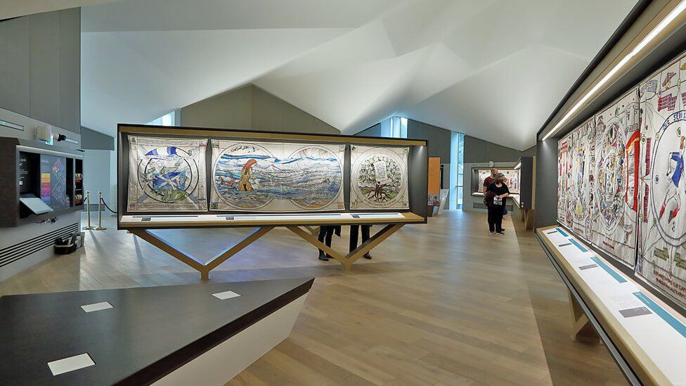 Around 1,000 stitchers created the 143 metre tapestry.