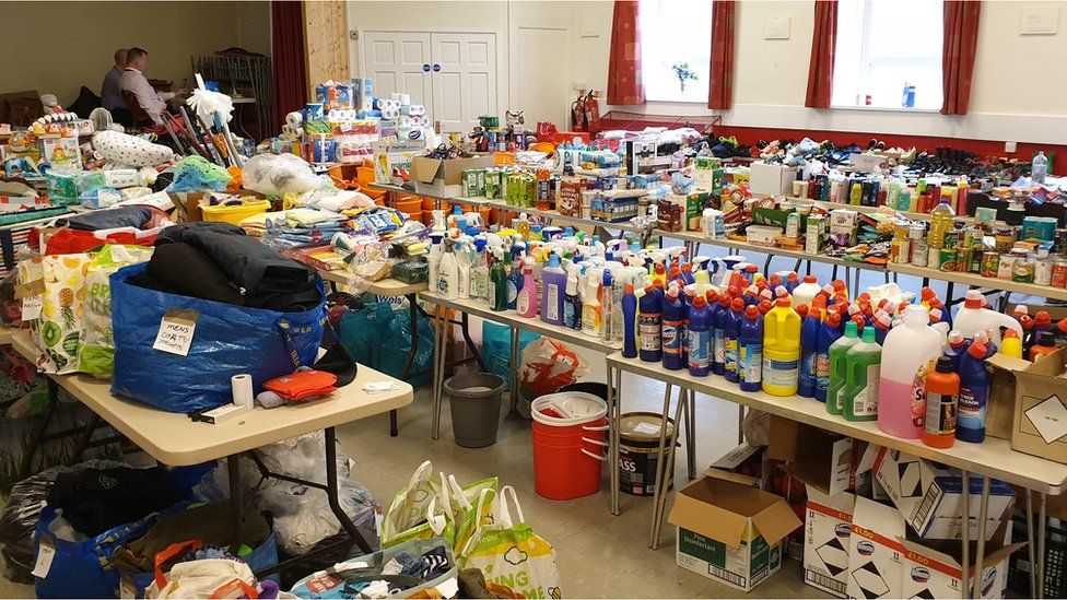 donations at Trallwn Community Centre in Pontypridd for flood victims