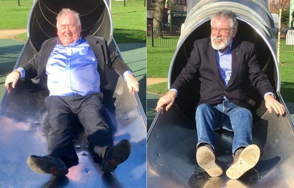 Fra McCann and Gerry Adams on a slide