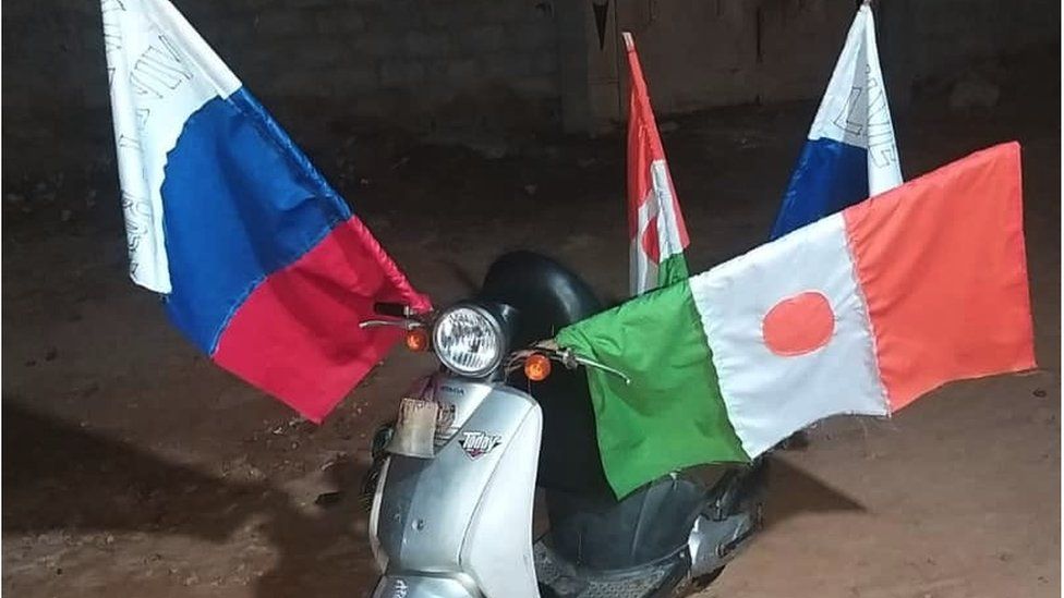 A Russian flag on a scooter