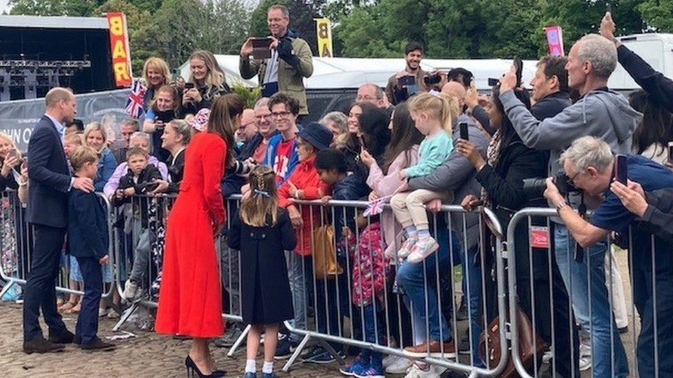 The Duke and Duchess of Cambridge with Prince George and Princess Charlotte meeting people at Cardiff Castle
